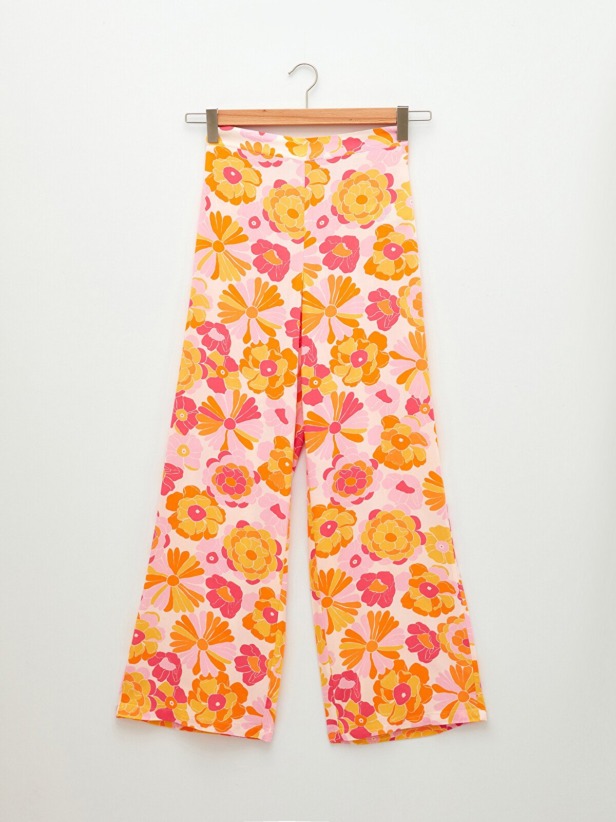 Pantalon fluide large a fleurs retro taille 40 destockage Maternita Dakar