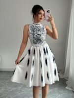robe-patineuse-mi-longue-blanche-imprime-noir-col-montant-maternita-dakarrobe-patineuse-mi-longue-blanche-imprime-noir-col-montant-maternita-dakar