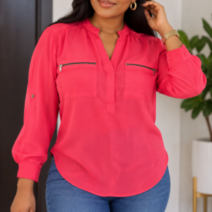 Femme portant une blouse fluide rose fuchsia taille 40 42 Bambinerie Maternita Dakar