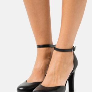 Escarpins noirs Tamaris talon 9 cm avec bride portés - Maternita Dakar